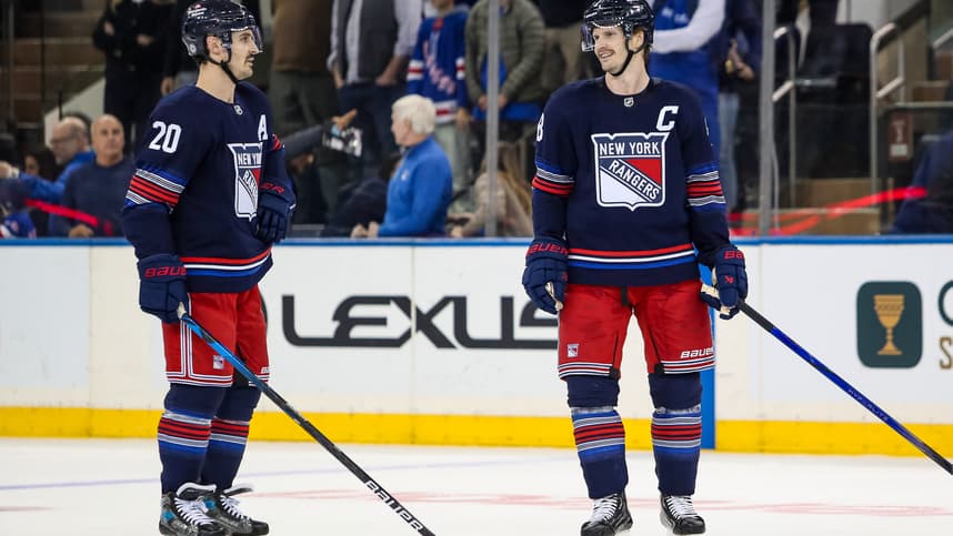 Nov 3, 2024; New York, New York, USA; New York Rangers defenseman Jacob Trouba (8) and left wing Chris Kreider (20) celebrate a win against the New York Islanders at Madison Square Garden. Mandatory Credit: Danny Wild-Imagn Images