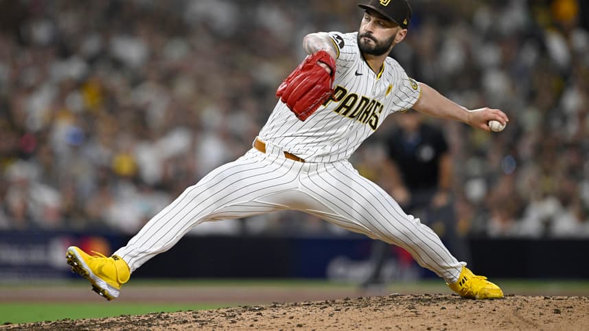 Oct 2, 2024; San Diego, California, USA; San Diego Padres pitcher Tanner Scott (66) throws during the sixth inning of game two in the Wildcard round for the 2024 MLB Playoffs against the Atlanta Braves at Petco Park. Mandatory Credit: Denis Poroy-Imagn Images