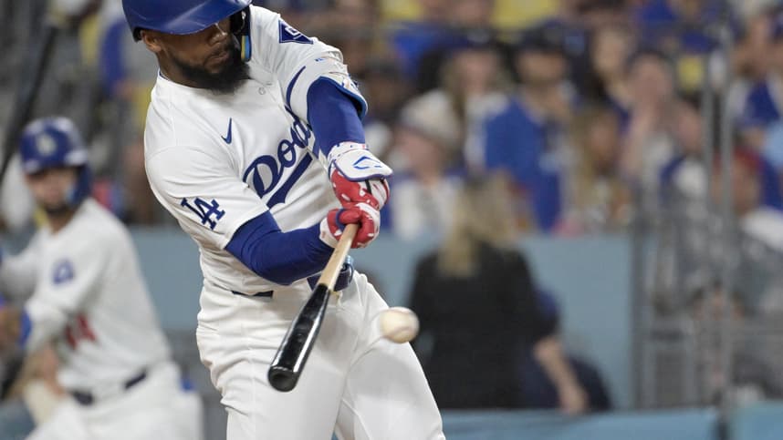 Jul 22, 2024; Los Angeles, California, USA; Los Angeles Dodgers left fielder Teoscar Hernandez (37) hits a RBI single in the sixth inning against the San Fransisco Giants at Dodger Stadium. Mandatory Credit: Jayne Kamin-Oncea-Imagn Images