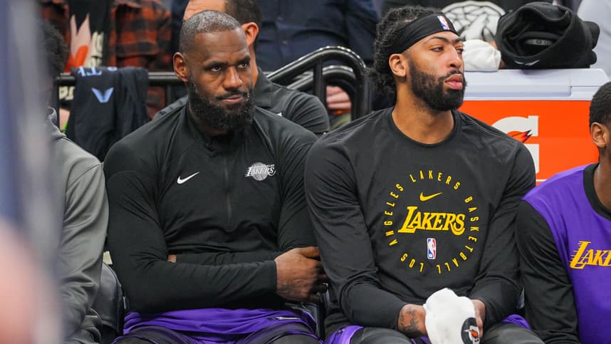 Dec 2, 2024; Minneapolis, Minnesota, USA; Los Angeles Lakers forward LeBron James (23) and forward Anthony Davis (3) on the bench against the Minnesota Timberwolves in the fourth quarter at Target Center. Mandatory Credit: Brad Rempel-Imagn Images