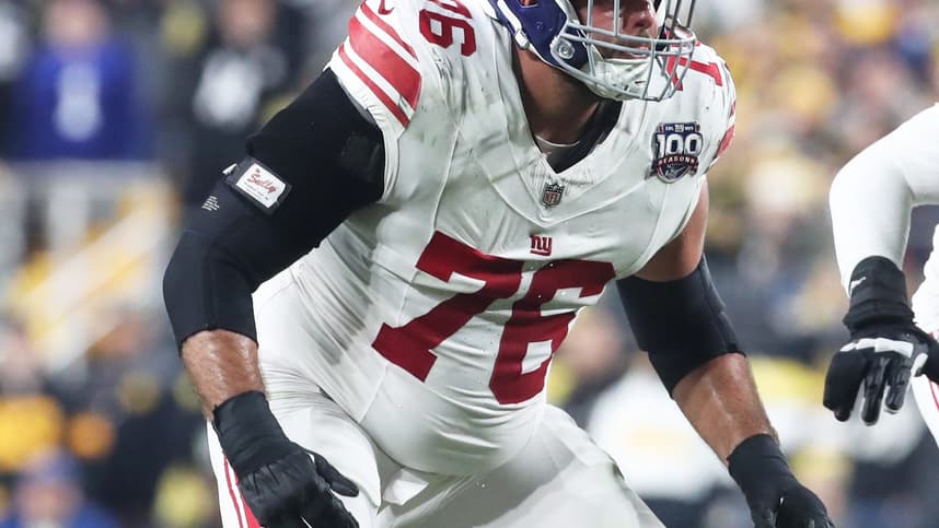 Oct 28, 2024; Pittsburgh, Pennsylvania, USA;  New York Giants guard Jon Runyan (76) blocks at the line of scrimmage against  the Pittsburgh Steelers during the second quarter at Acrisure Stadium. Mandatory Credit: Charles LeClaire-Imagn Images