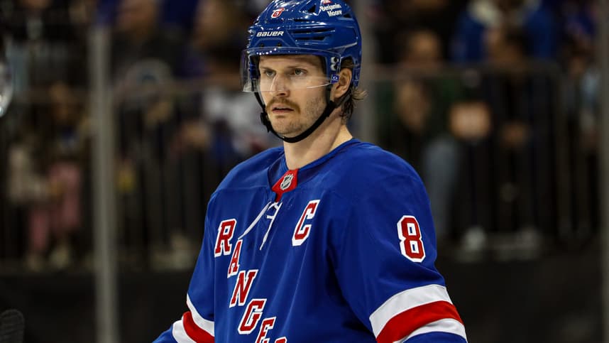 Nov 25, 2024; New York, New York, USA; New York Rangers defenseman Jacob Trouba (8) skates against the St. Louis Blues during the first period at Madison Square Garden. Mandatory Credit: Danny Wild-Imagn Images