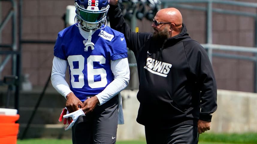New York Giants head coach Brian Daboll, right, greets wide receiver Darius Slayton (86) on the first day of mandatory minicamp at the Giants training center in East Rutherford on Tuesday, June 13, 2023.