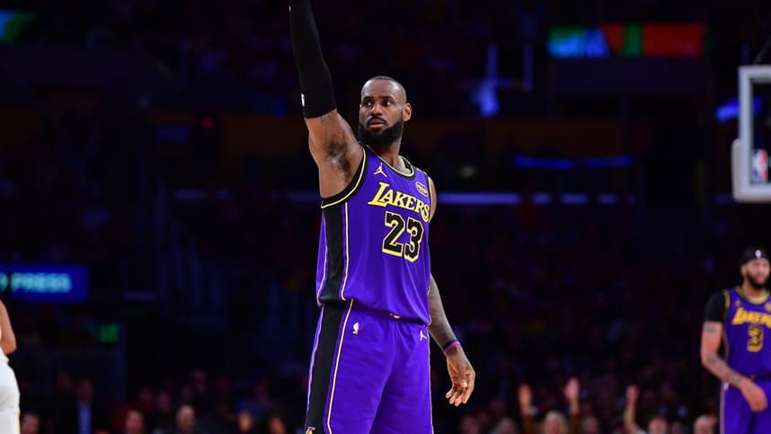 Jan 3, 2025; Los Angeles, California, USA;  Los Angeles Lakers forward LeBron James (23) reacts after scoring three point basket against the Atlanta Hawks during the second half at Crypto.com Arena. Mandatory Credit: Gary A. Vasquez-Imagn Images