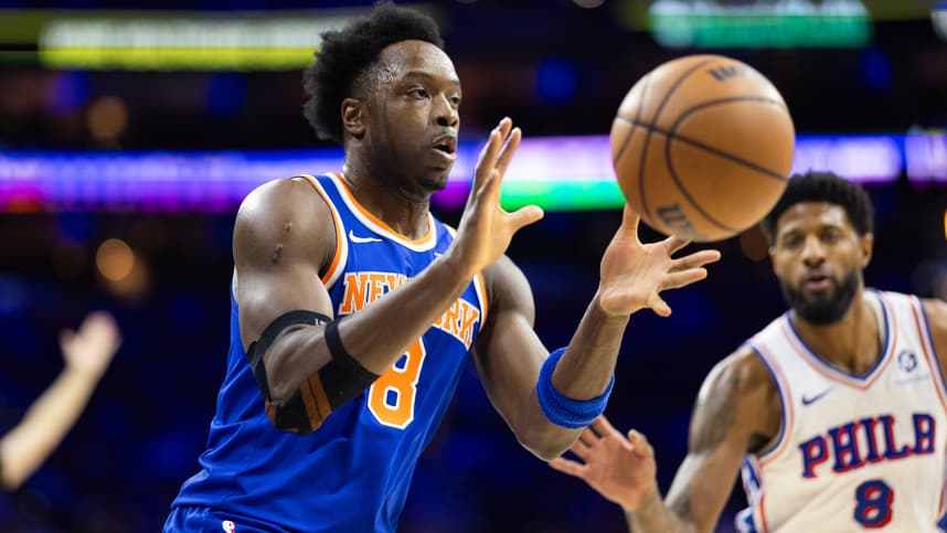 Jan 15, 2025; Philadelphia, Pennsylvania, USA; New York Knicks forward OG Anunoby (8) catches a pass in front of Philadelphia 76ers forward Paul George (8) during the first quarter at Wells Fargo Center. Mandatory Credit: Bill Streicher-Imagn Images