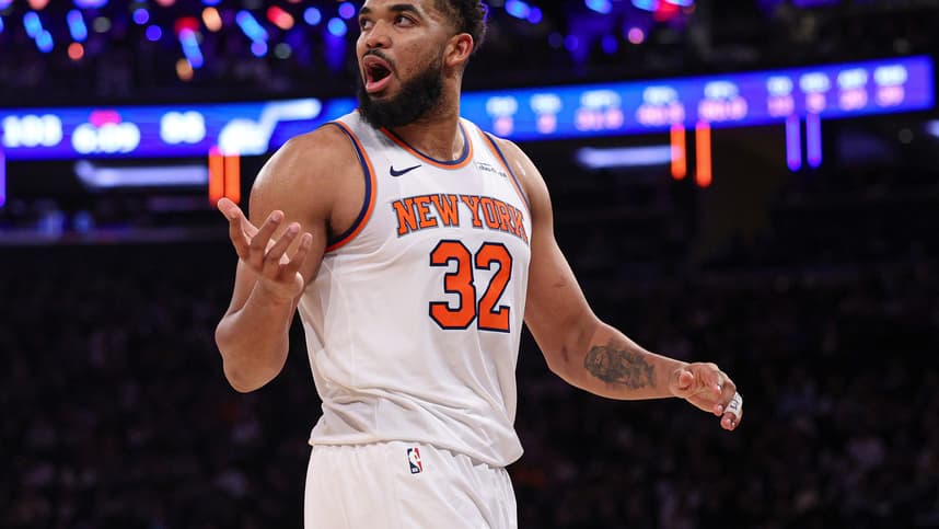 Jan 1, 2025; New York, New York, USA; New York Knicks center Karl-Anthony Towns (32) reacts during the second half against the Utah Jazz at Madison Square Garden. Mandatory Credit: Vincent Carchietta-Imagn Images