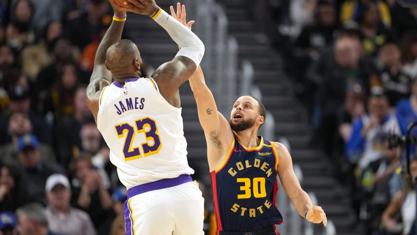 Jan 25, 2025; San Francisco, California, USA; Golden State Warriors guard Stephen Curry (30) defends against Los Angeles Lakers forward LeBron James (23) during the fourth quarter at Chase Center. Mandatory Credit: Darren Yamashita-Imagn Images