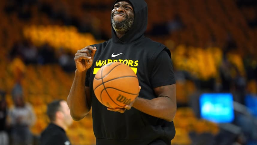 May 12, 2025; San Francisco, California, USA; Golden State Warriors forward Draymond Green (23) holds onto the ball during warmups against the Minnesota Timberwolves during game four of the second round for the 2025 NBA Playoffs at Chase Center. Mandatory Credit: Cary Edmondson-Imagn Images