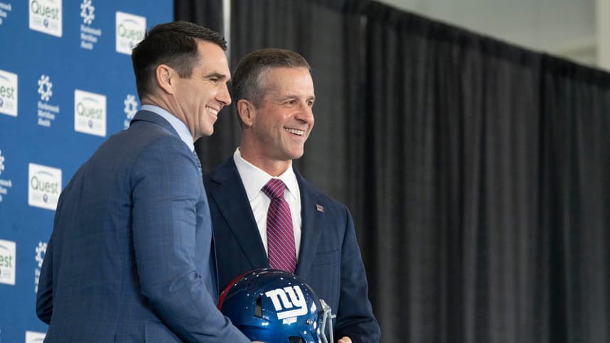 General Manager Joe Schoen and new New Giants Head Coach John Harbaugh hold a NY Giants helmet during a press conference welcoming Harbaugh at the Quest Diagnostics Training Center in East Rutherford on Tuesday, Jan. 20, 2025.