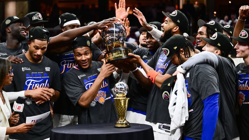 Knicks players celebrate after reaching the NBA Finals