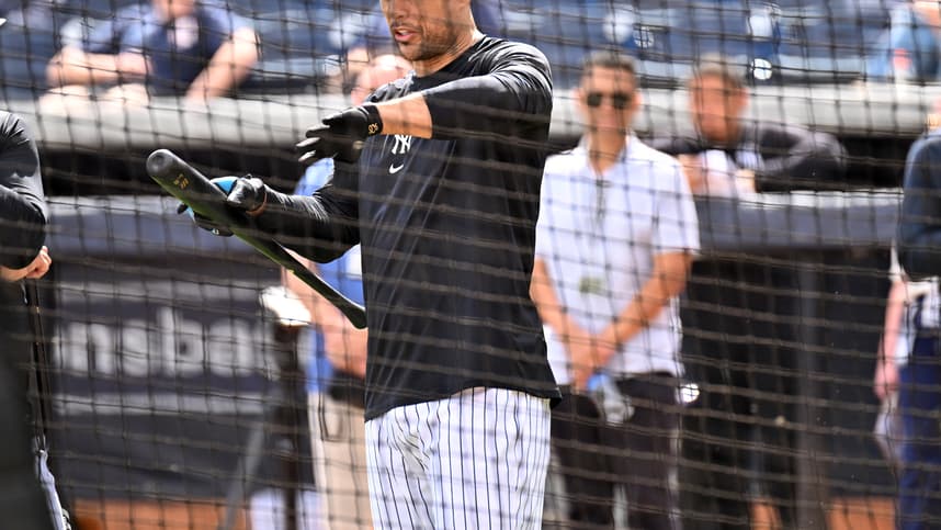 Giancarlo Stanton takes batting practice for the Yankees during spring training