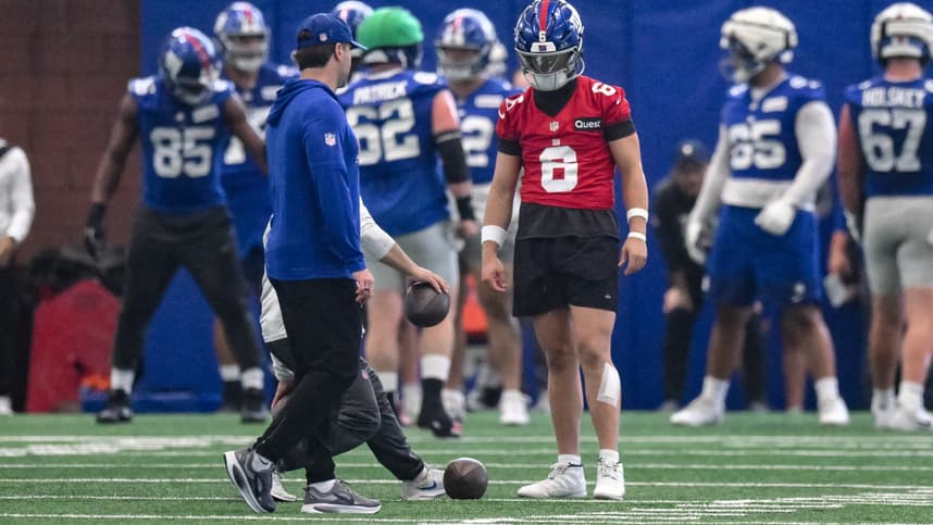 Jaxson Dart participates in a drill during Giants OTAs