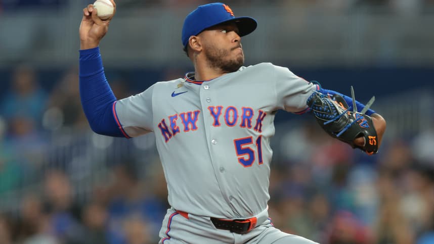 Freddy Peralta delivers a pitch for the Mets against the Marlins