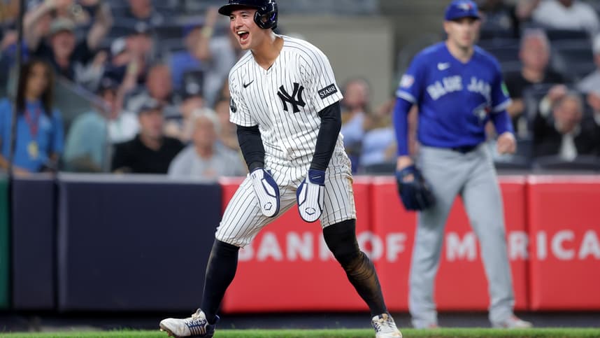 Anthony Volpe reacts after scoring for the Yankees against Toronto