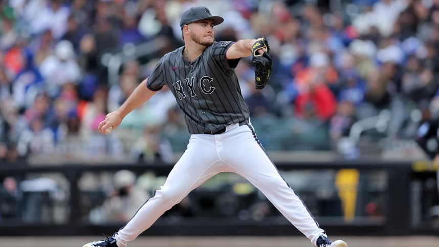 Christian Scott pitches for the Mets against the Marlins