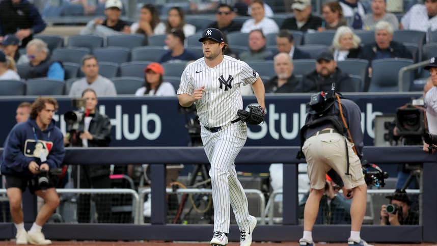 Gerrit Cole runs onto the field before facing the Rays at Yankee Stadium