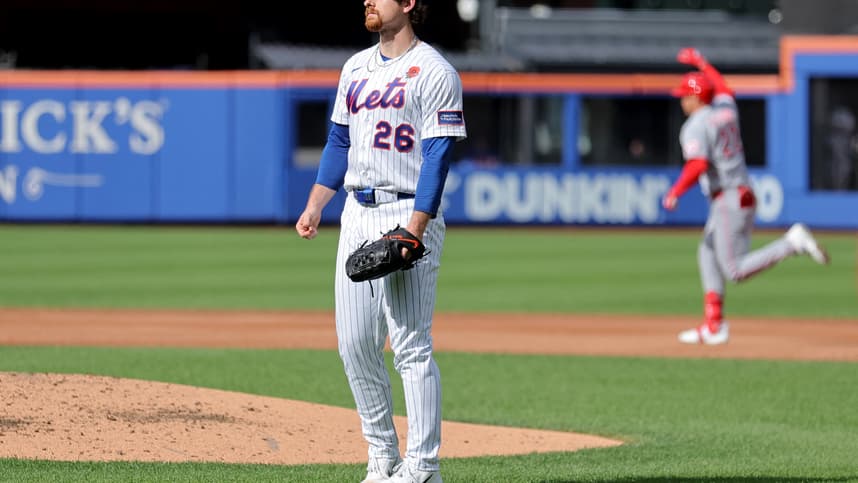 Nolan McLean reacts after allowing a home run for the Mets against the Reds