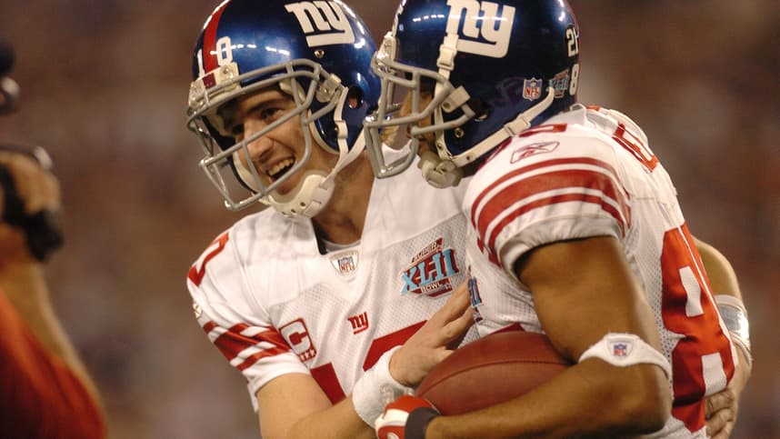 On February 3, 2018, Eli Manning with celebrates David Tyree after a touchdown during Super Bowl XLII Sunday.7xl00loj