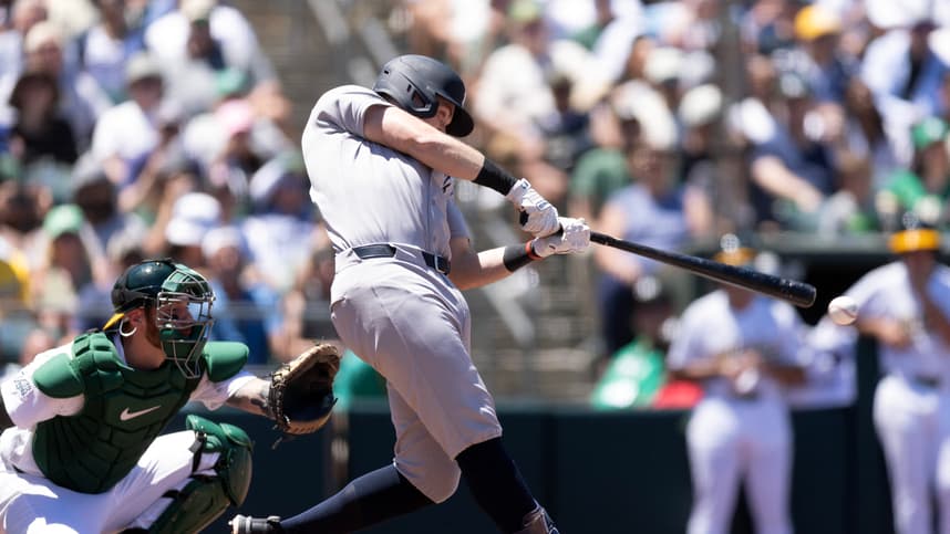 Ben Rice driving a ball for the Yankees