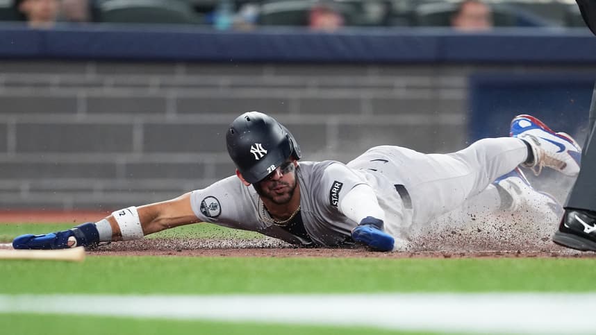 José Caballero scores a run for the Yankees in Toronto