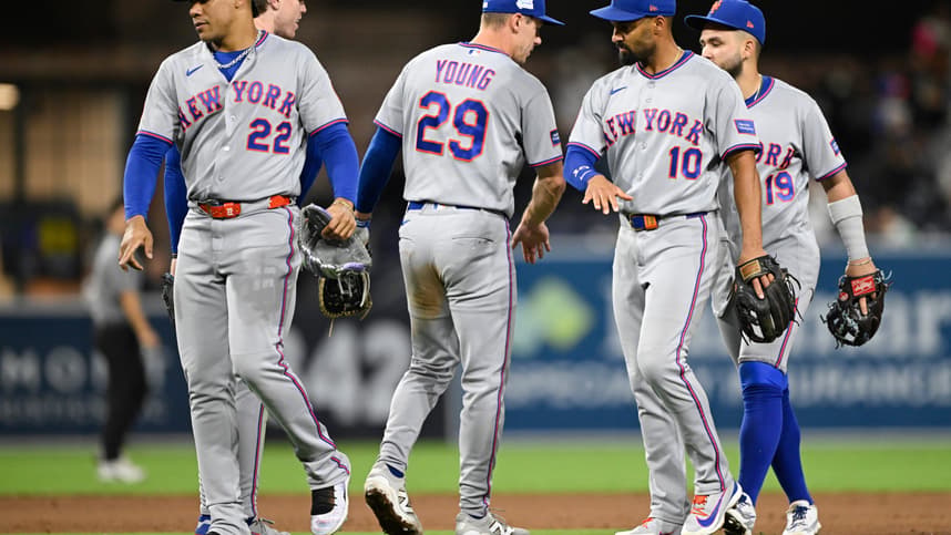 Mets players celebrate after a win over the Padres in San Diego
