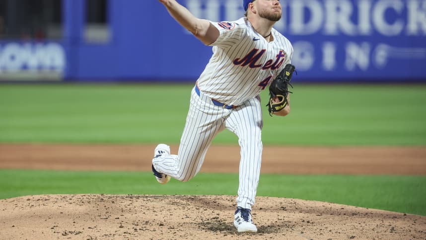 Christian Scott pitches for the Mets against the Marlins