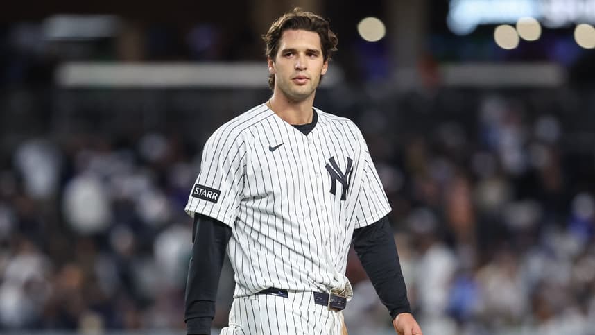 Spencer Jones stands in the outfield for the Yankees against Toronto