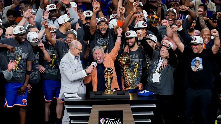 Knicks players celebrate winning the NBA championship