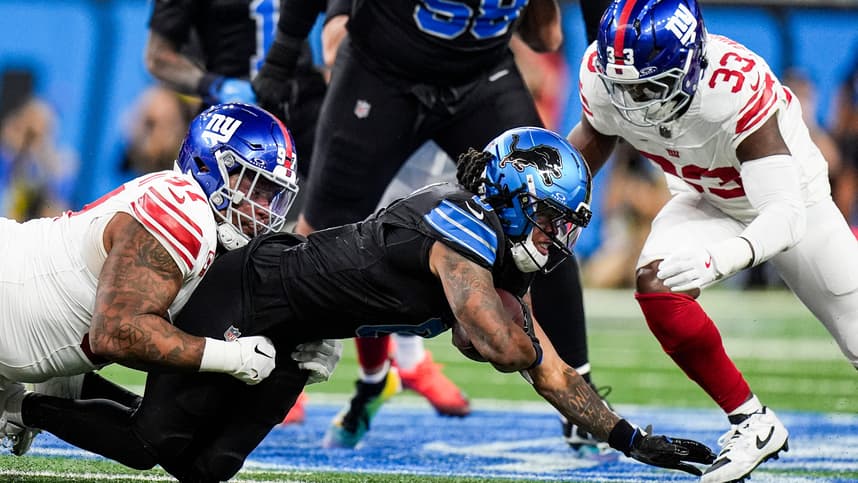 Dexter Lawrence rushes the passer during an NFL game