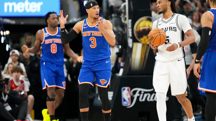 Josh Hart walks during Knicks-Spurs NBA Finals action