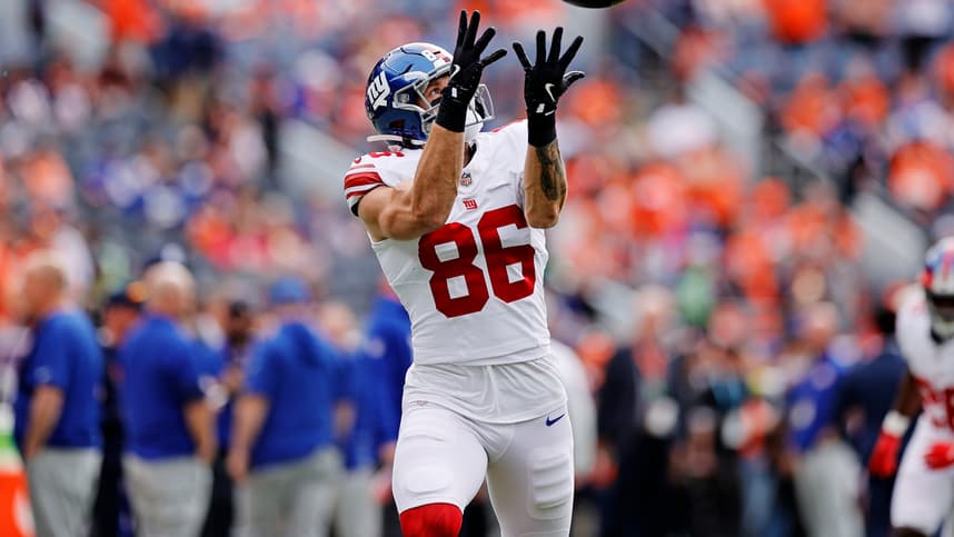 Thomas Fidone warming up before a Giants game