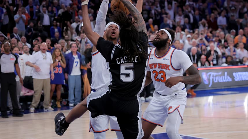Mitchell Robinson near a Josh Hart block for the Knicks during the NBA Finals