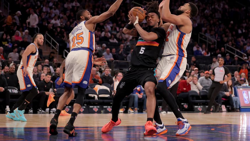 Mikal Bridges contests a shot for the Knicks against the Spurs