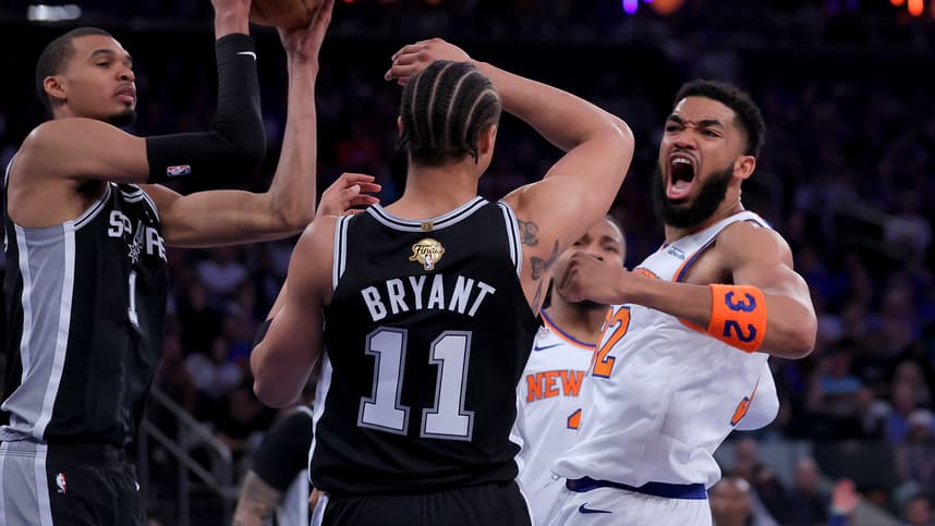 Victor Wembanyama defending Karl-Anthony Towns in the NBA Finals