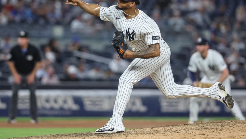 Camilo Doval pitches in the ninth inning for the Yankees against the Blue Jays