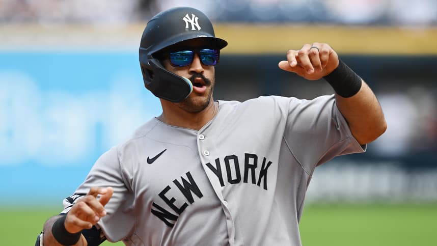 Trent Grisham sliding into third base for the Yankees