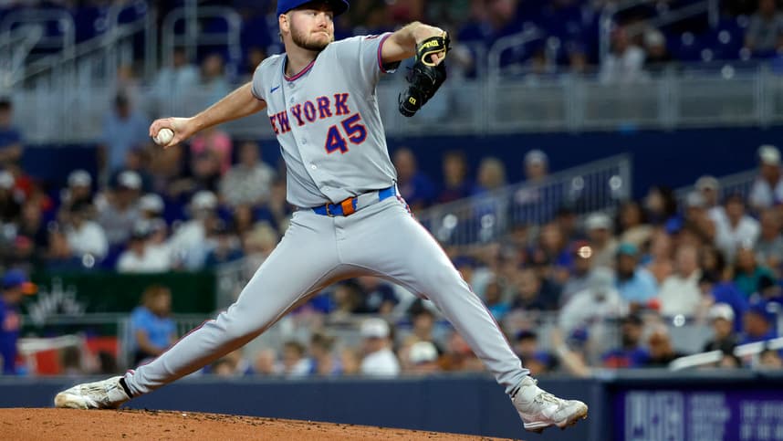 Christian Scott throws a pitch for the Mets in Miami