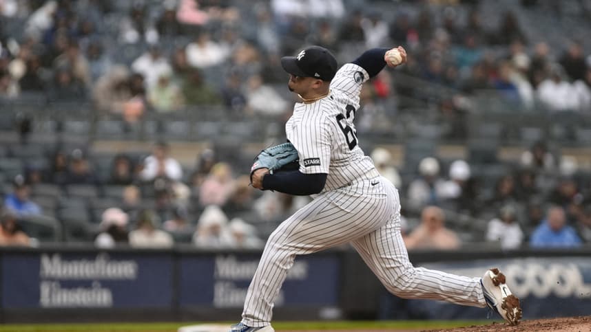 Fernando Cruz throws for the Yankees at Yankee Stadium