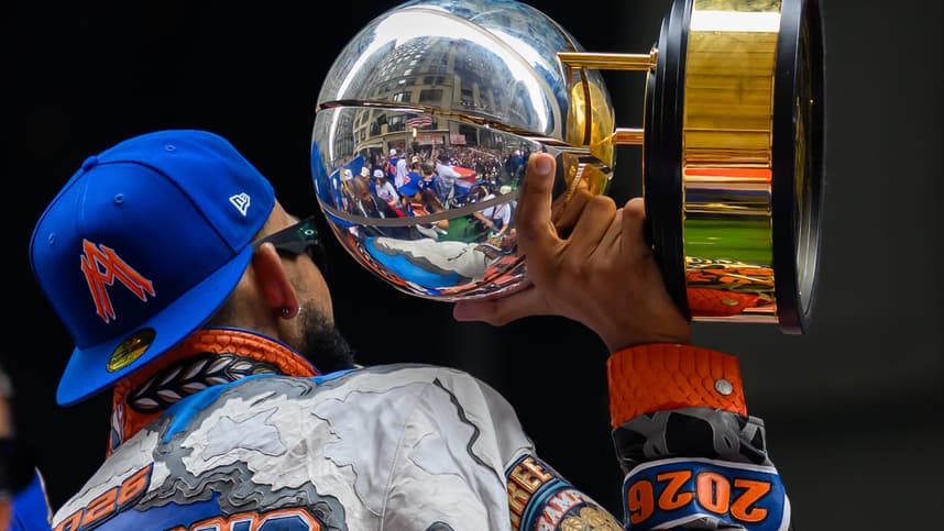 Karl-Anthony Towns celebrating with the Knicks championship trophy