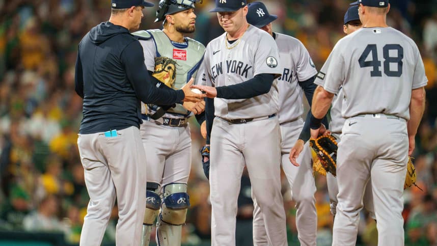 Aaron Boone making a pitching change for the Yankees