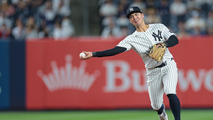 Anthony Volpe throws across the diamond for the Yankees against the Guardians