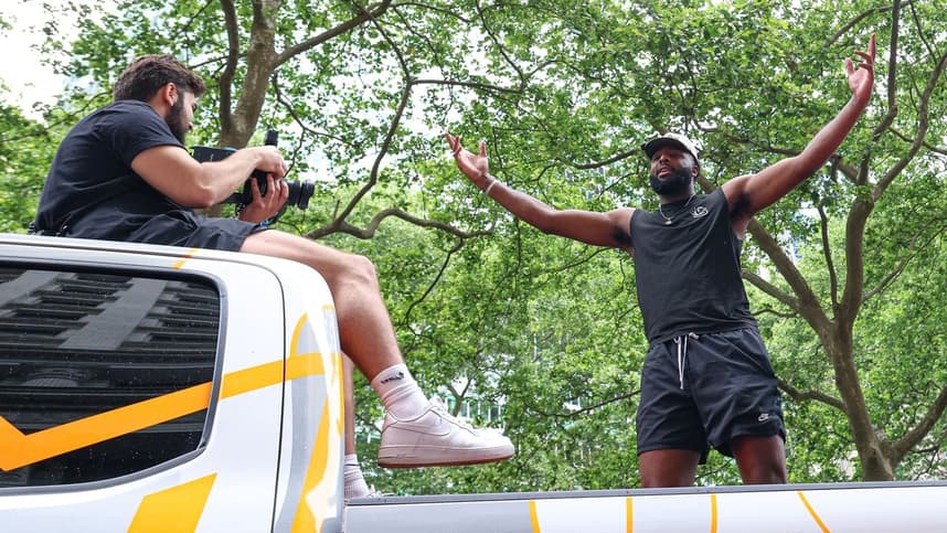 Mitchell Robinson celebrating with Knicks fans after the championship