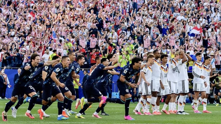 Paraguay players celebrate after upsetting Germany at the World Cup