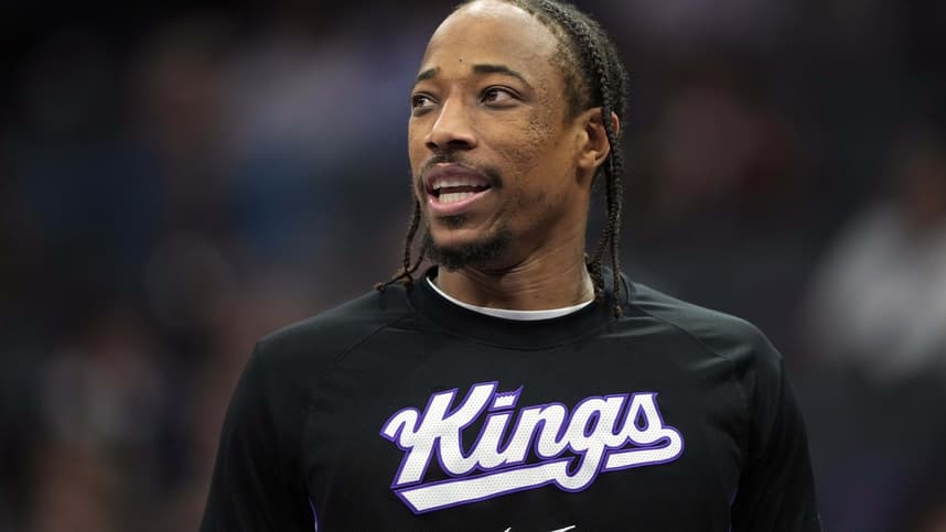 DeMar DeRozan looks on before a Kings game as a Knicks option