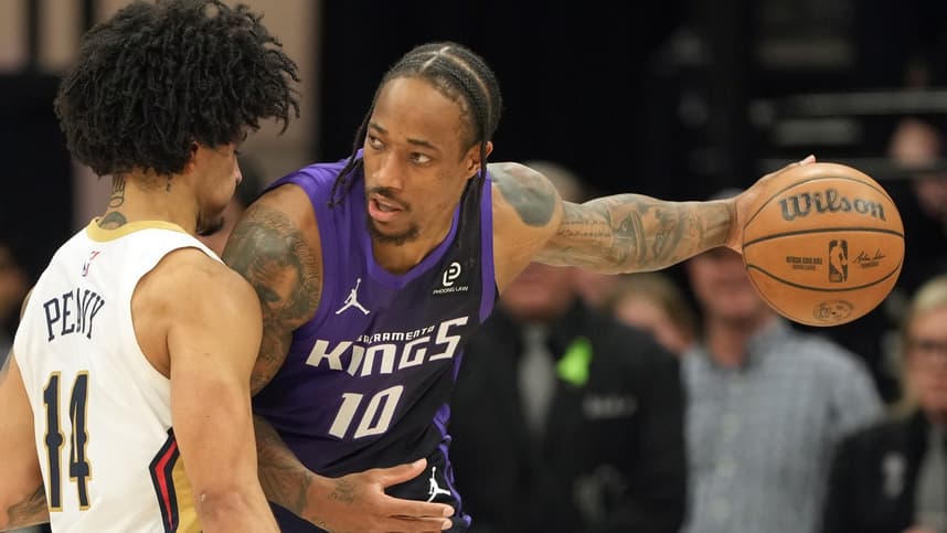 DeMar DeRozan dribbles for the Kings as a Knicks buyout idea