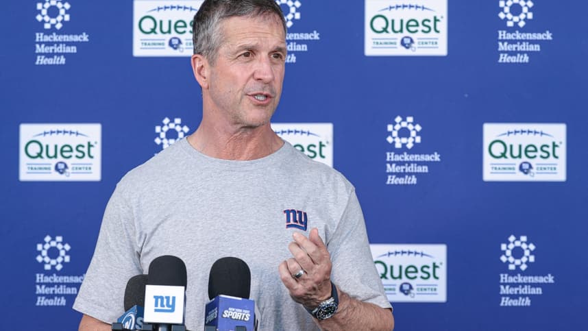 John Harbaugh talks with media after Giants organized team activities