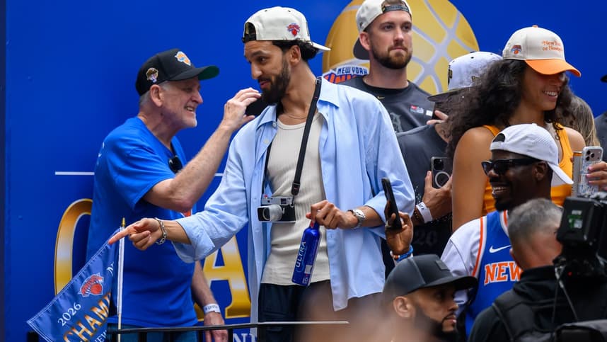Landry Shamet points to the crowd during the Knicks championship parade