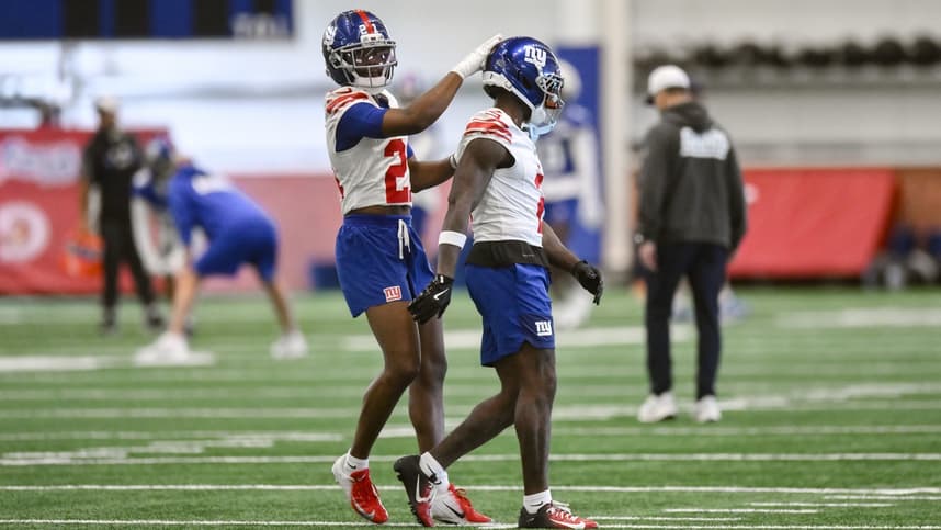 Paulson Adebo works during Giants organized team activities
