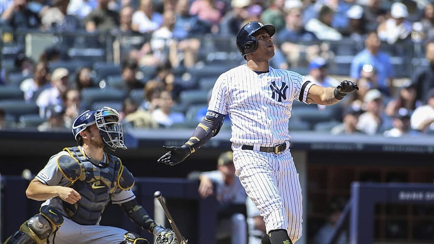 New York Yankees outfielder Aaron Hicks hits a home-run against the Tampa Bay Rays.