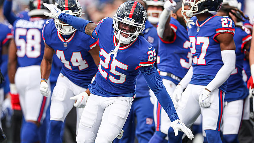 New York Giants cornerback Deonte Banks (25) celebrates after an interception against the Washington Commanders during the first half at MetLife Stadium